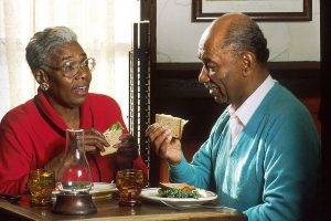 Elderly couple having lunch