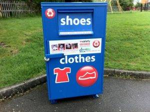 blue shoes and clothes donation bin