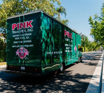 back view of the pink moving company truck